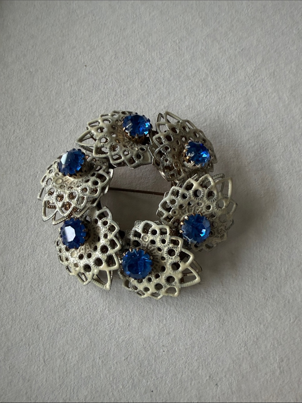 Silver-Tone Floral Wreath Brooch with Royal Blue Crystals